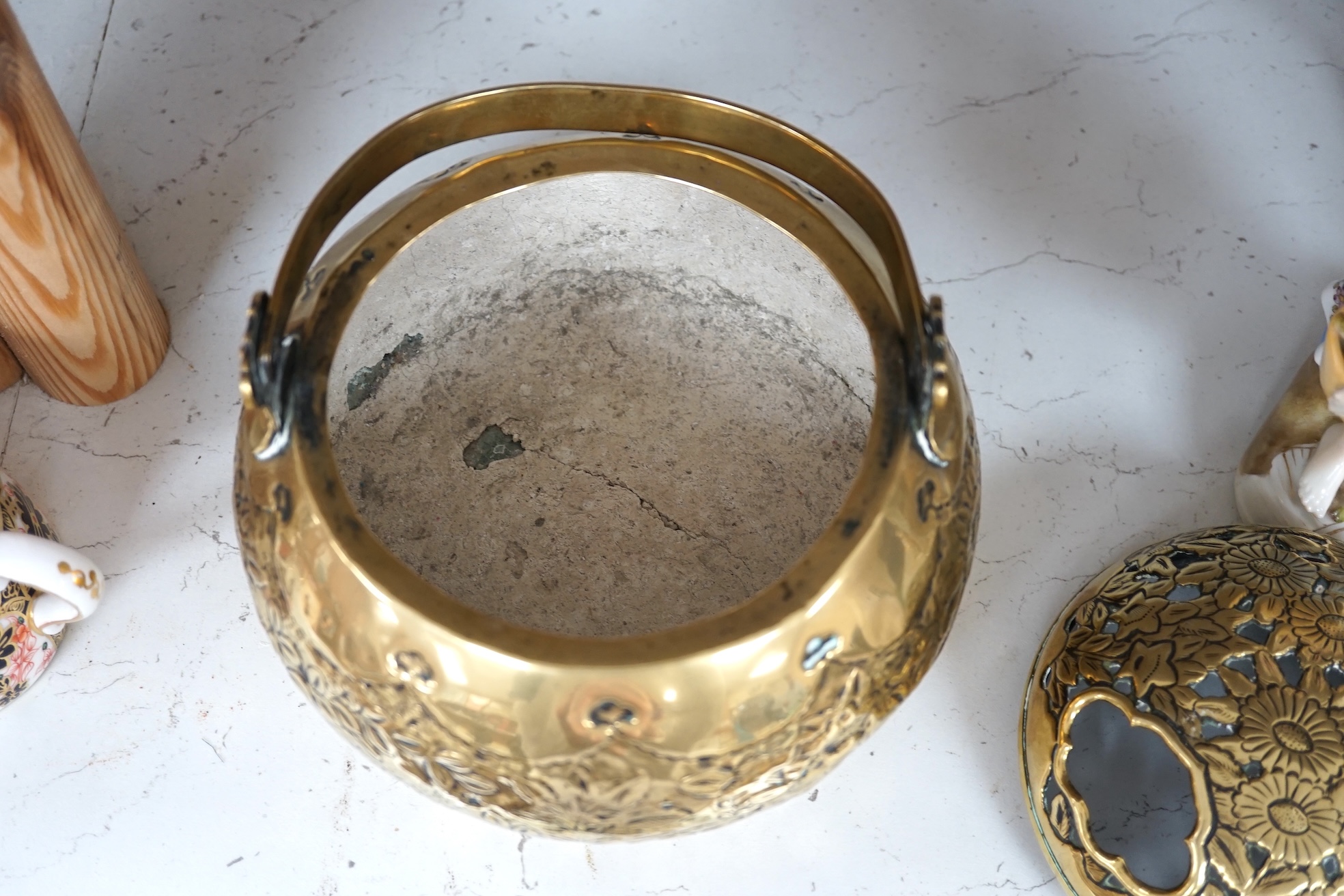 A Chinese brass basket censer and cover, 13cm high. Condition - fair.